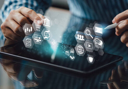 24-113 Businessman using tablet on global business network for online banking and payment for online shopping, digital marketing. Financial technology and big data on internet of thing concept.