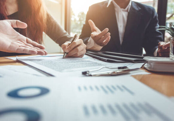 Business Signing a Contract Buy - sell house.