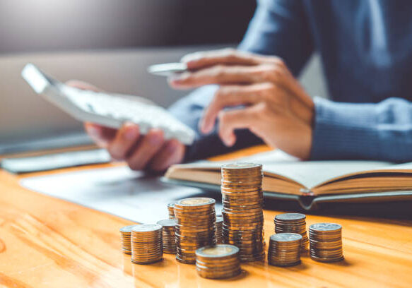 24-67 Saving money concept Man hand putting Row and coin Write Finance Saving money concept Man hand putting Row and coin Write Finance